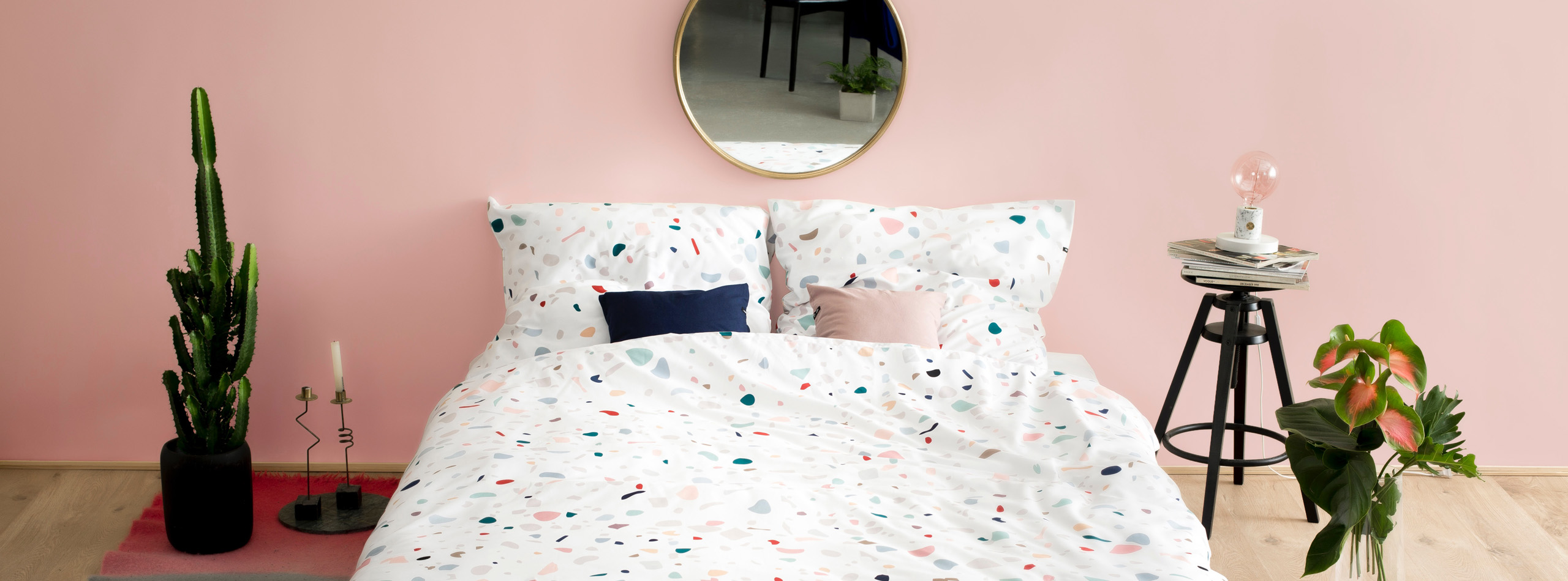 Picture of a bed with custom printed duvet covers